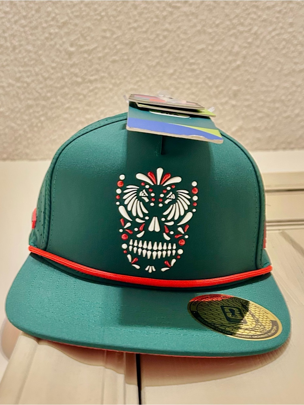 Teal Snapback Cap with Sugar Skull Design and Red Accents